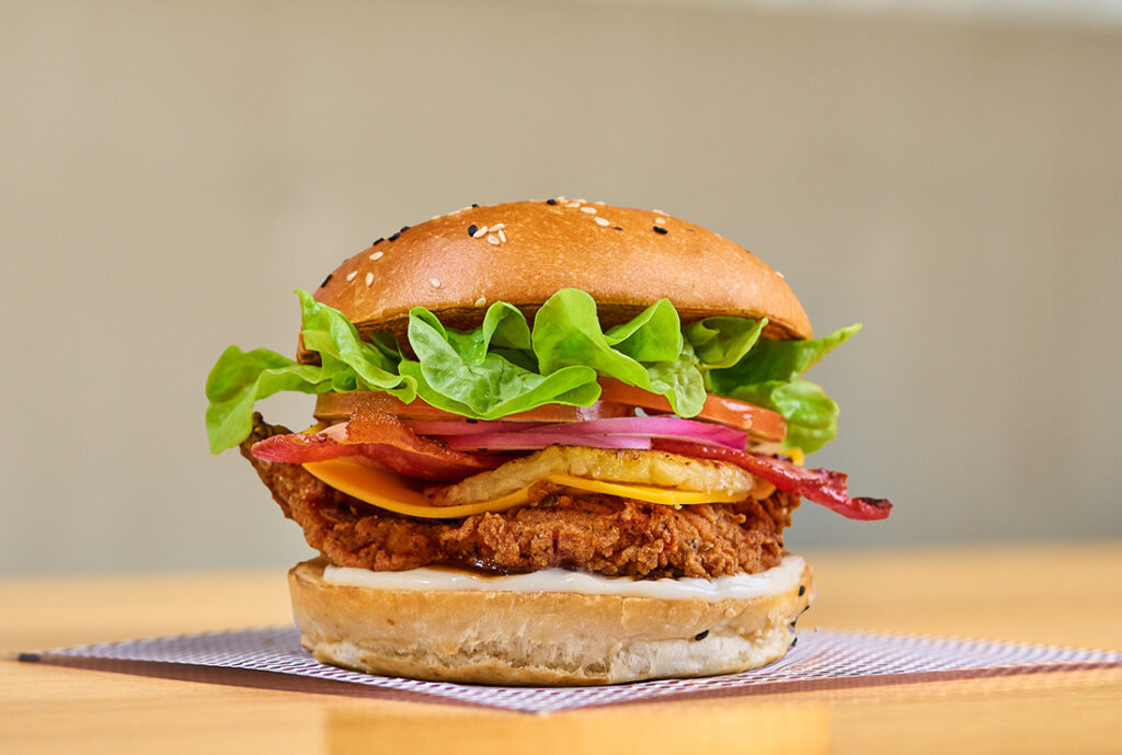 Luau Luau Chicken Burger from YOMG ~ southern fried chicken, cheese, bacon, pineapple, lettuce, tomato, onion, BBQ sauce, mayo