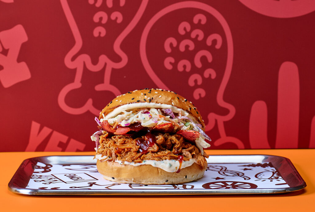 Country Hick #YOMGLimited Burger by YOMG ~ slow cooked pulled pork, bacon, slaw, buttermilk ranch, sweet baby ray’s smokey BBQ sauce