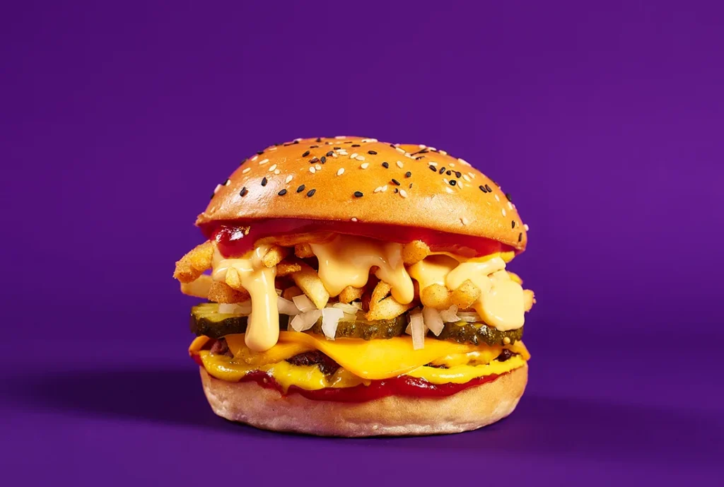 YOMG The Shooey Angus Beef and Showstring Fries Burger Menu Item - beef, double cheese, onion, pickles, shoestring fries, cheese sauce, ketchup, american mustard
