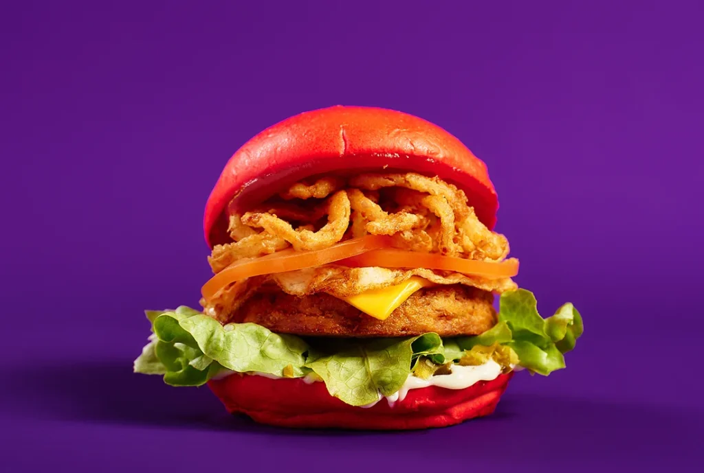 YOMG Vegapalooza Vegetable Fritter Vegetarian Burger Menu Item - vegetable fritter, cheese, egg, lettuce, tomato, onion fries, jalapenos, mayo, ketchup
