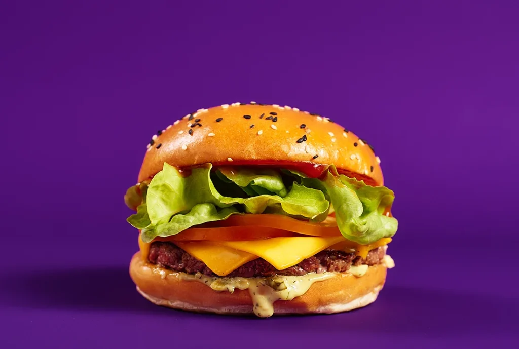 YOMG Yo My with Cheese Beef Burger Menu Item - beef, double cheese, lettuce, tomato, ketchup, secret sauce - make it a veg yo my + $1