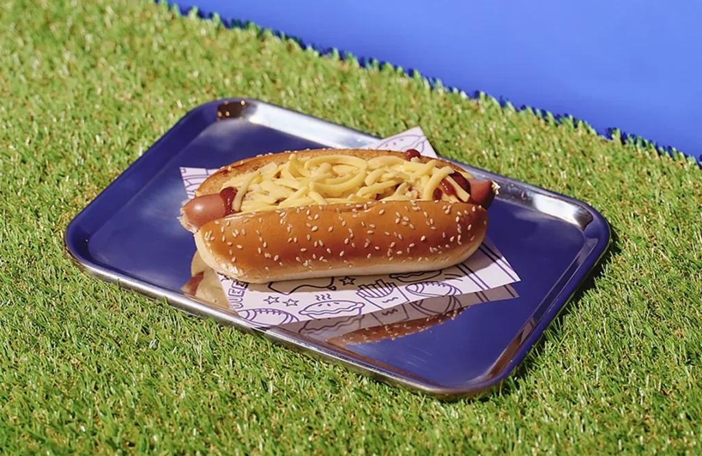 Chilli Cheese Dog by YOMG ~ beef hotdog, cheese sauce, chilli sauce, tasty cheese, hoagie bun #yomgitsHOT #YOMGlimited Menu